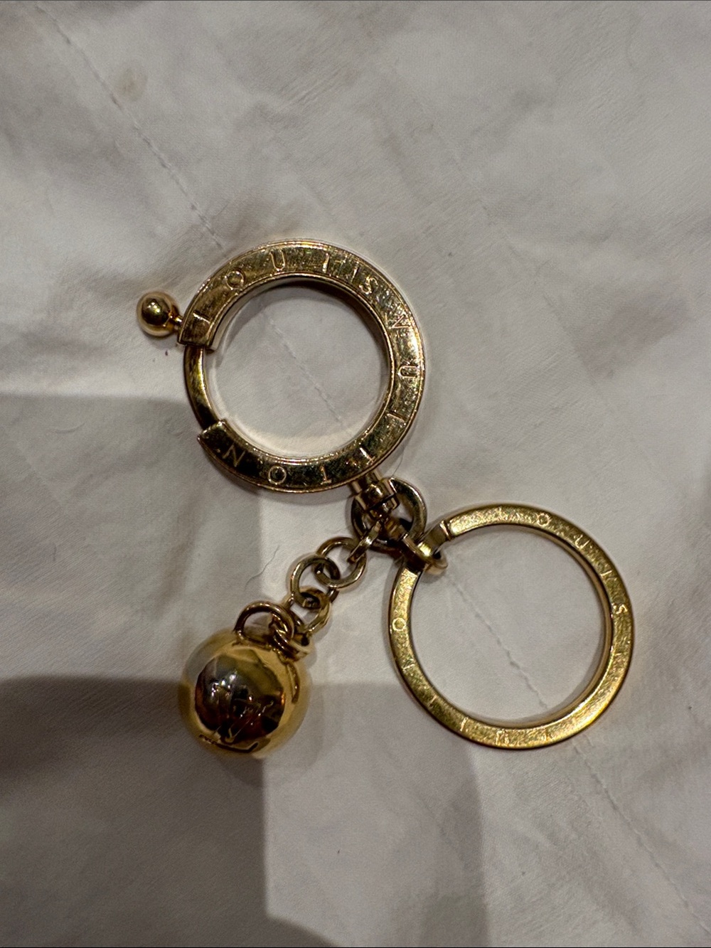 Louis Vuitton Gold-Tone Round Ring Key Holder with LV Charm